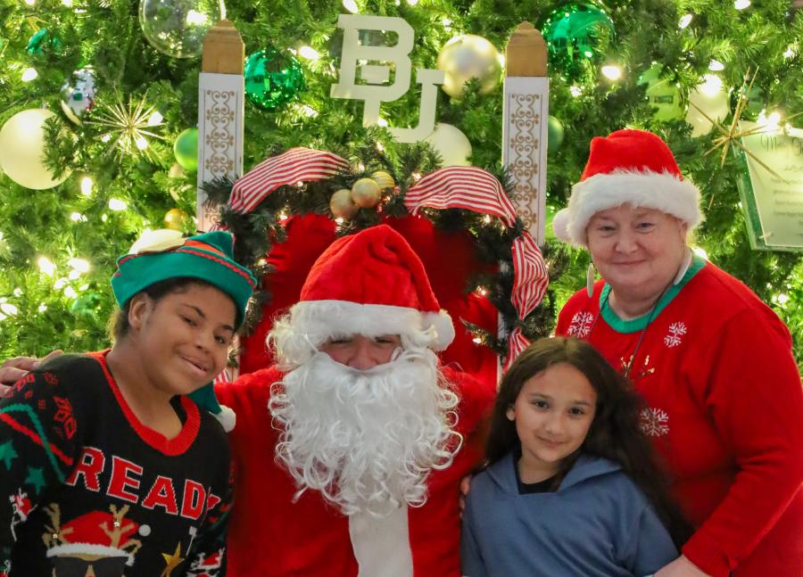 Photo of family with Santa at Starry Night Event