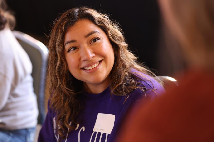 Photo of someone smiling at a B2B event