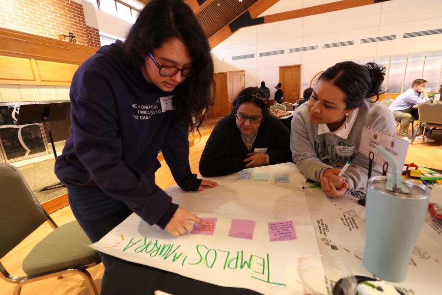 Photo of church team members working on a project together